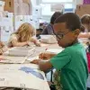 Updated review - strategies to help implementation of healthy behaviours in schools